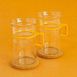 Vintage yellow Bodum tall coffee mugs + cork coasters